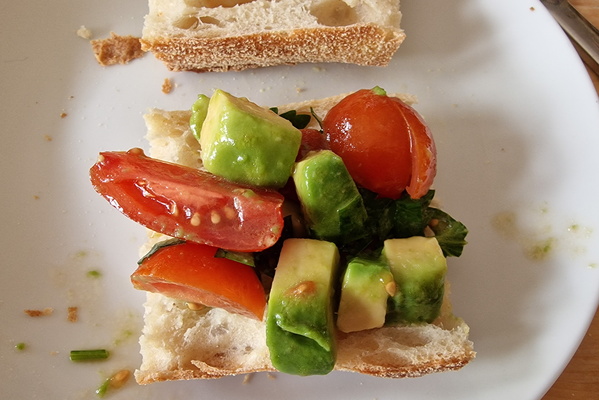 Avocado and tomato on bread