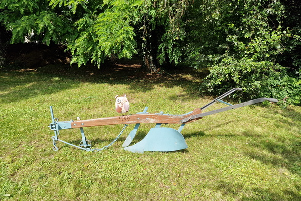 Even the owl agrees—this plow's retired for good!