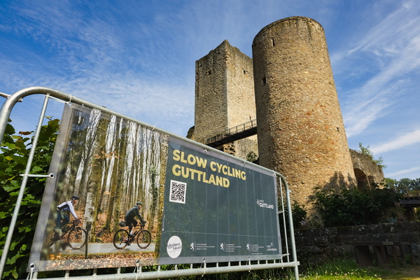 Slow cycling Guttland banner