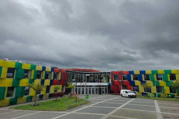 Colourful boxes or a school?