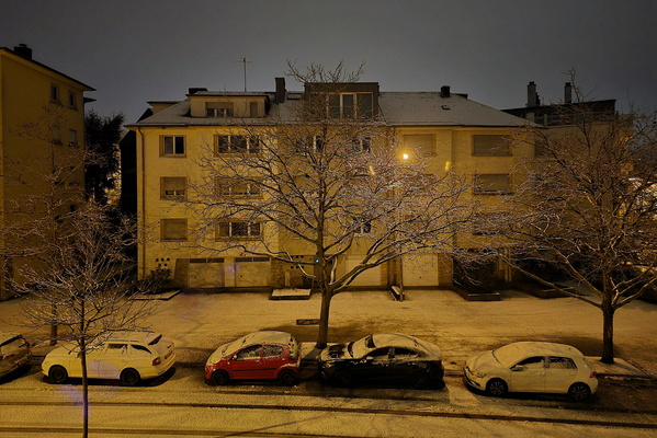 Winter sprites dancing on rooftops