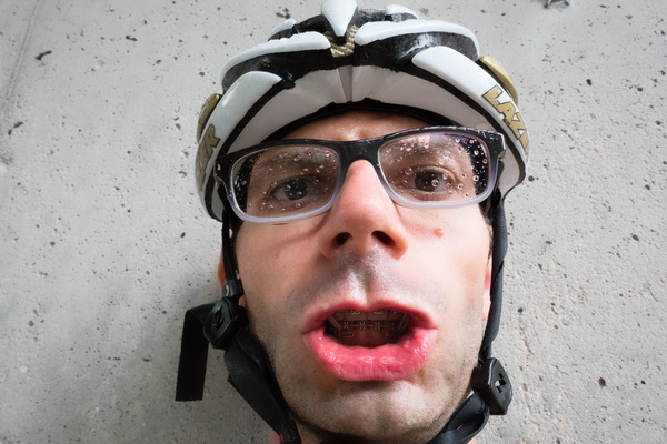 The Braced Cyclist's Rain-Soaked Selfie