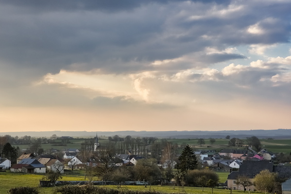 Houses, fields, clouds… look, a church!